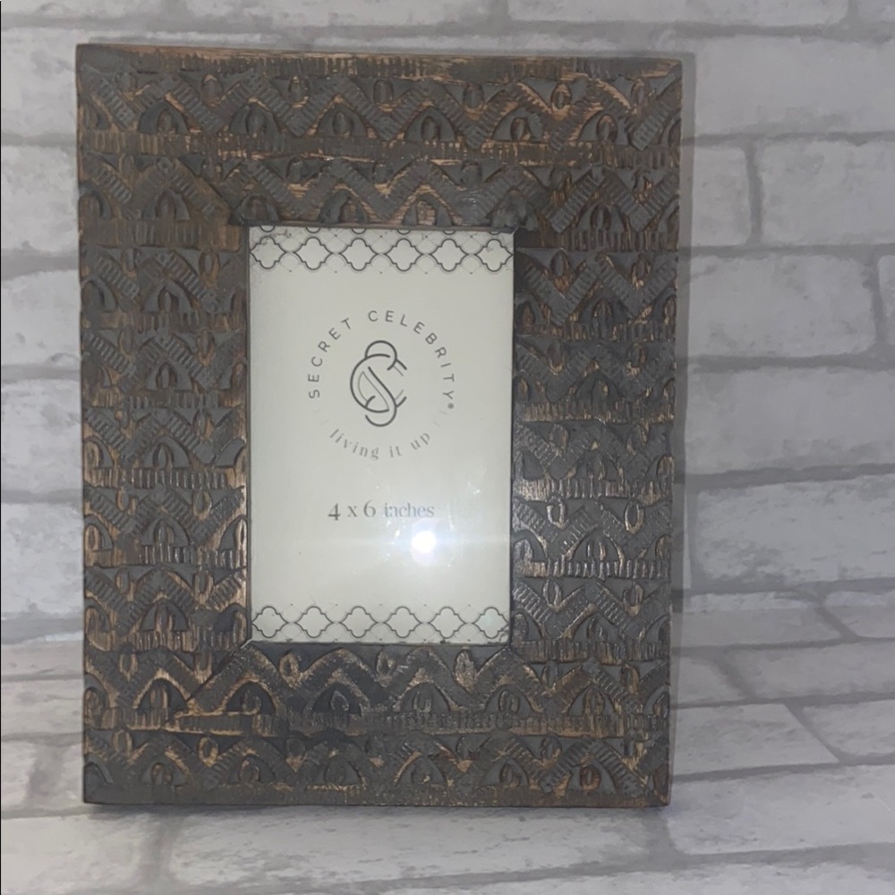 Brown Ornate Picture Frame with Intricate Detailing